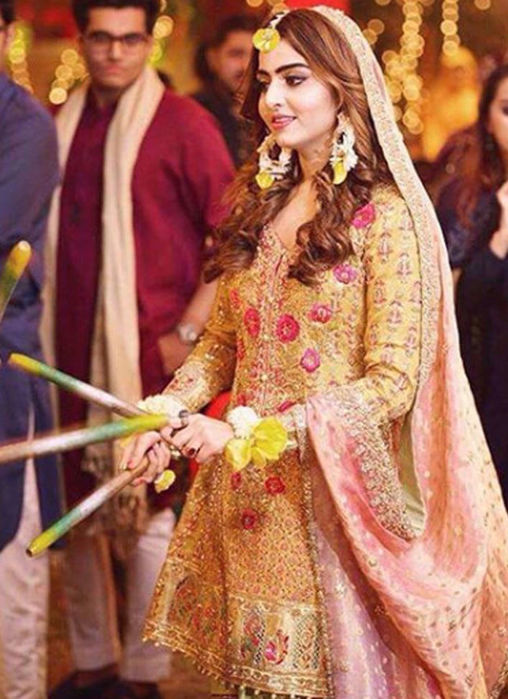Picture of Sara, Glowing In A Saffron Yellow Kalidaar Paired With A Mint Gharara