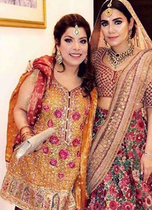 Picture of Eesha Hussain In A Burnt Orange And Scarlet Red Ensemble